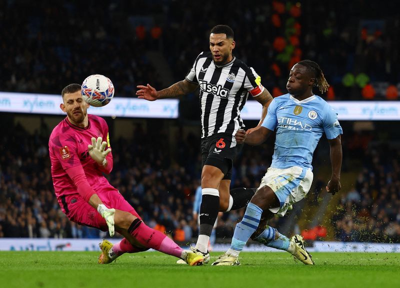 Soccer-Manchester City go into FA Cup semis after 2-0 win over Newcastle