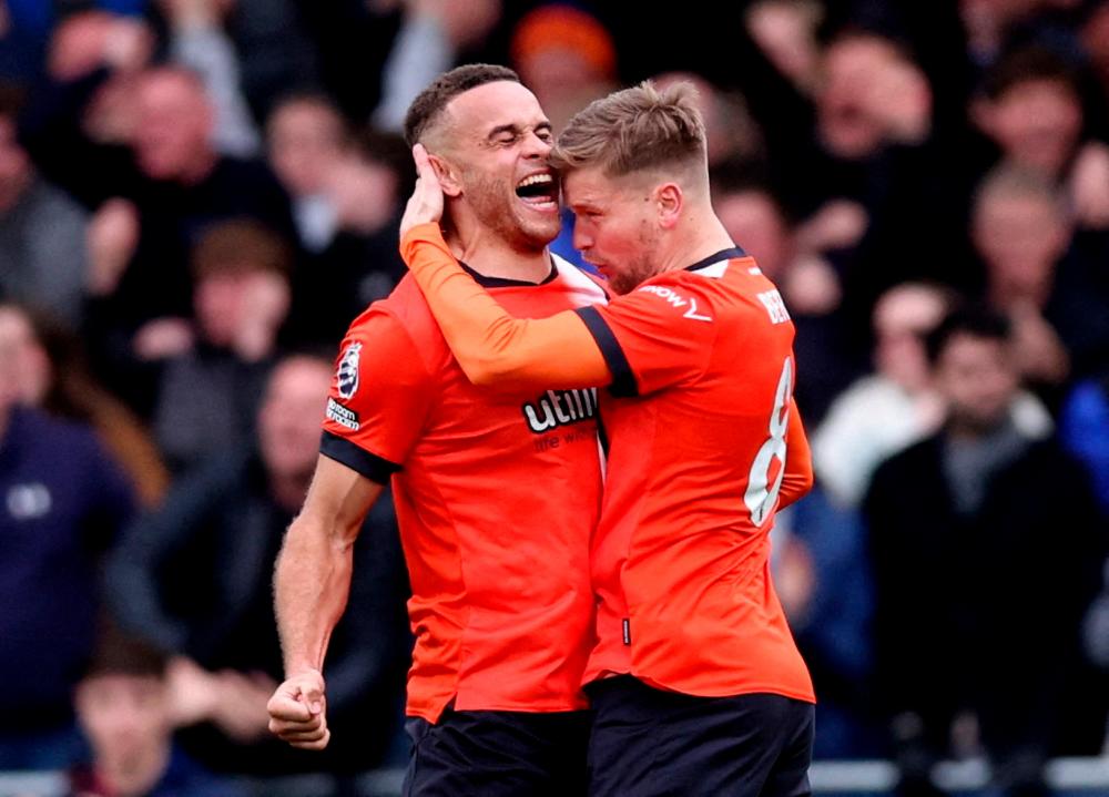 Luton rescue draw with Forest as Burnley keep survival hopes alive