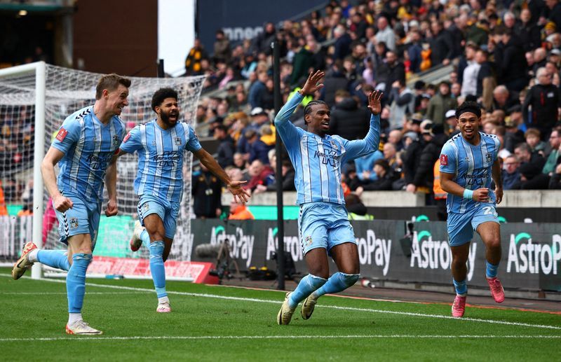 Soccer-Coventry stun Wolves with two injury-time goals to reach FA Cup semis