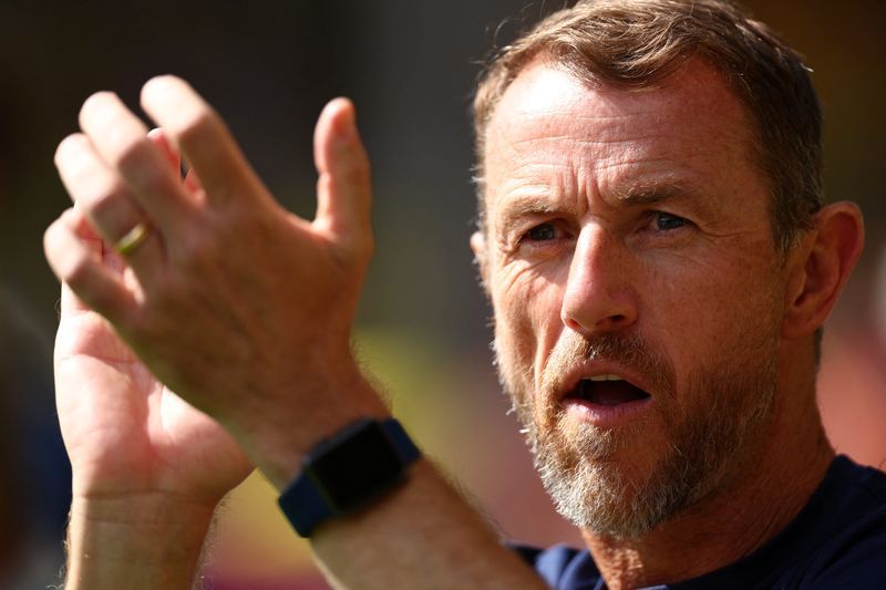 Soccer-Birmingham appoint Rowett as interim manager, Mowbray takes medical leave