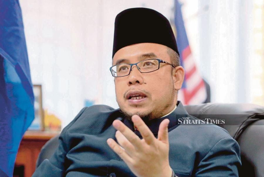 Perlis mufti Dr Mohd Asri among 10 persons of interest named in the disappearance of activist Amri Che Mat