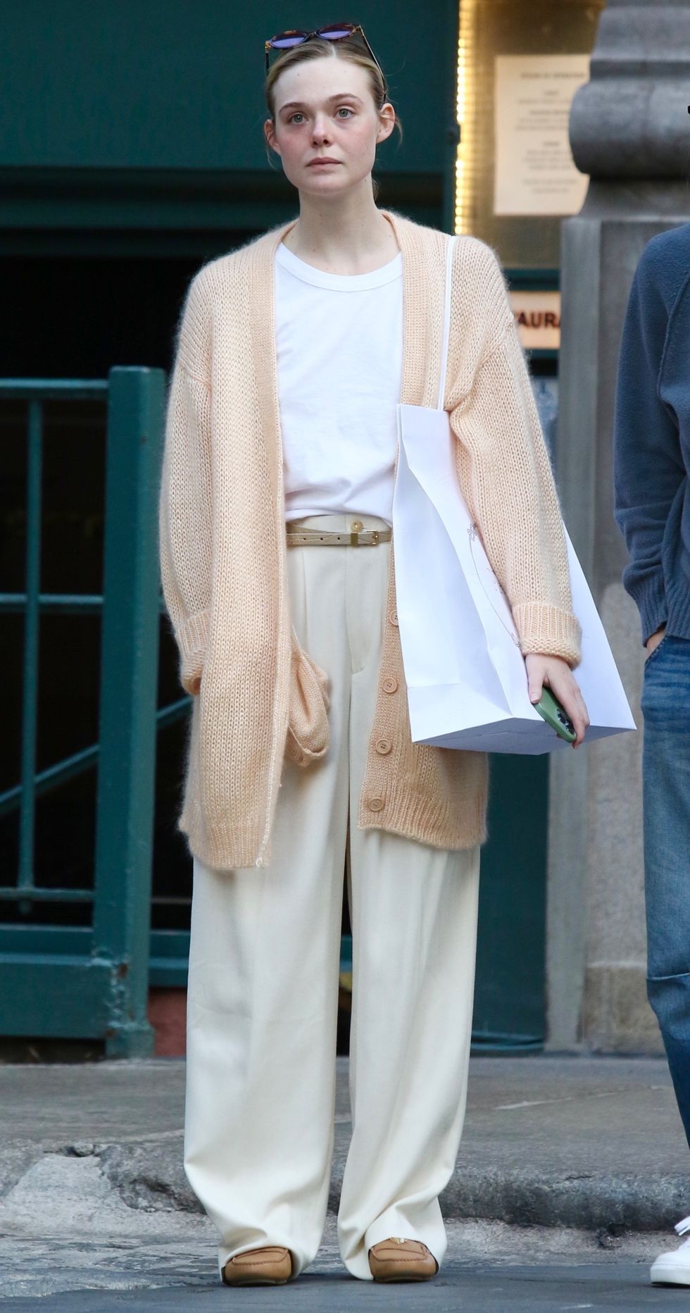 Elle Fanning’s Creamy Peach Cardigan Is Why This Outfit Works