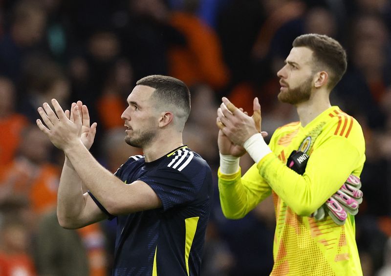Soccer-Scotland embarrassed by Dutch thrashing, McGinn says