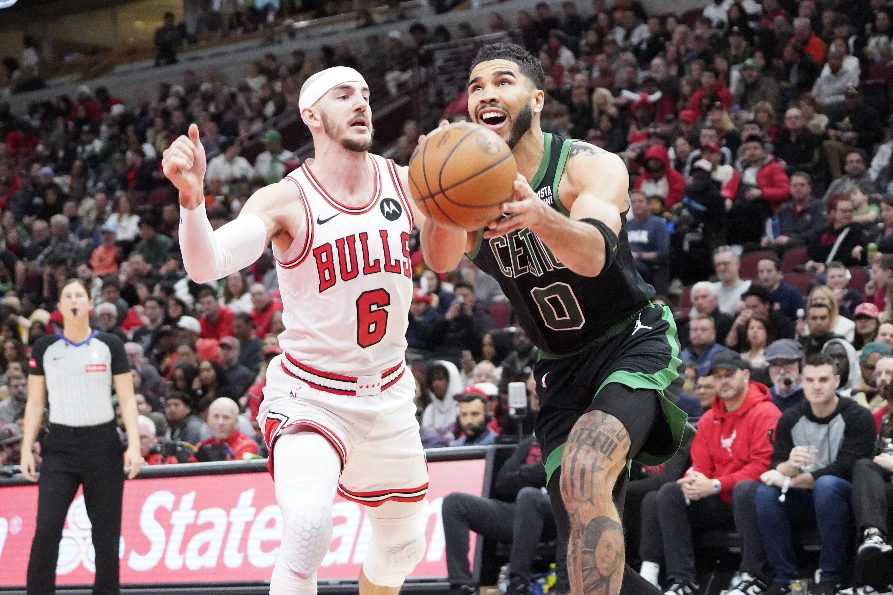 Boston Celtics pass Chicago Bulls test to push NBA winning streak to nine games