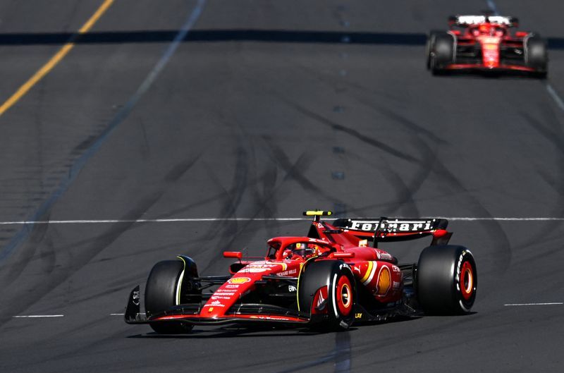 Motor racing-Ferrari revel in putting Red Bull under pressure