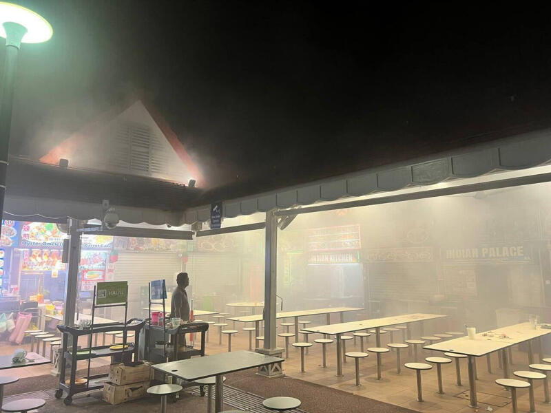 Fire at Newton Food Centre hawker stall likely caused by unattended cooking, 2 taken to hospital