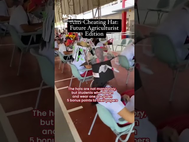 University students in the Philippines take exams in bizarre headgear