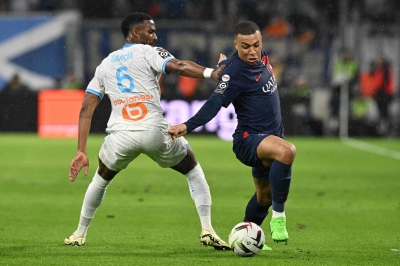 PSG overcome red card to beat Marseille and take step closer to title