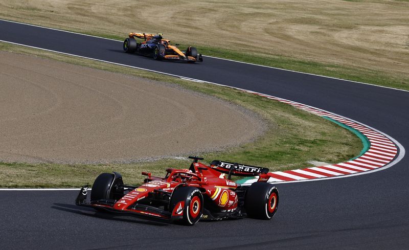 Motor racing-Leclerc delighted with Ferrari strategy in Japan