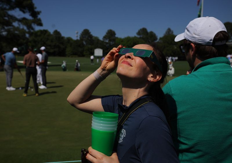 Golf-Masters eclipse steals spotlight from Augusta National