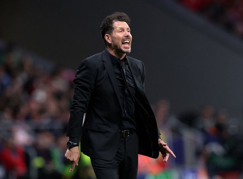 Soccer-Atletico ready to suffer in Dortmund, says Simeone