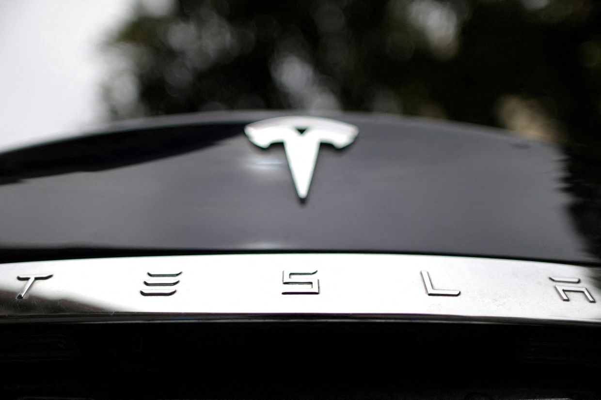 Toddler was able to start ‘defective’ Tesla and crashed into pregnant mom, US lawsuit says
