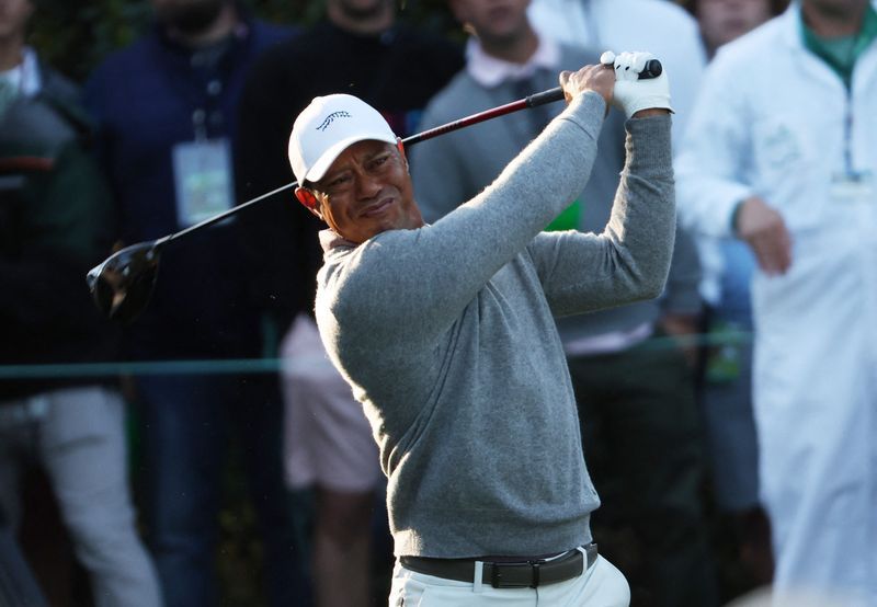 Golf-Marathon ahead as DeChambeau leads, Woods looks for more Augusta magic