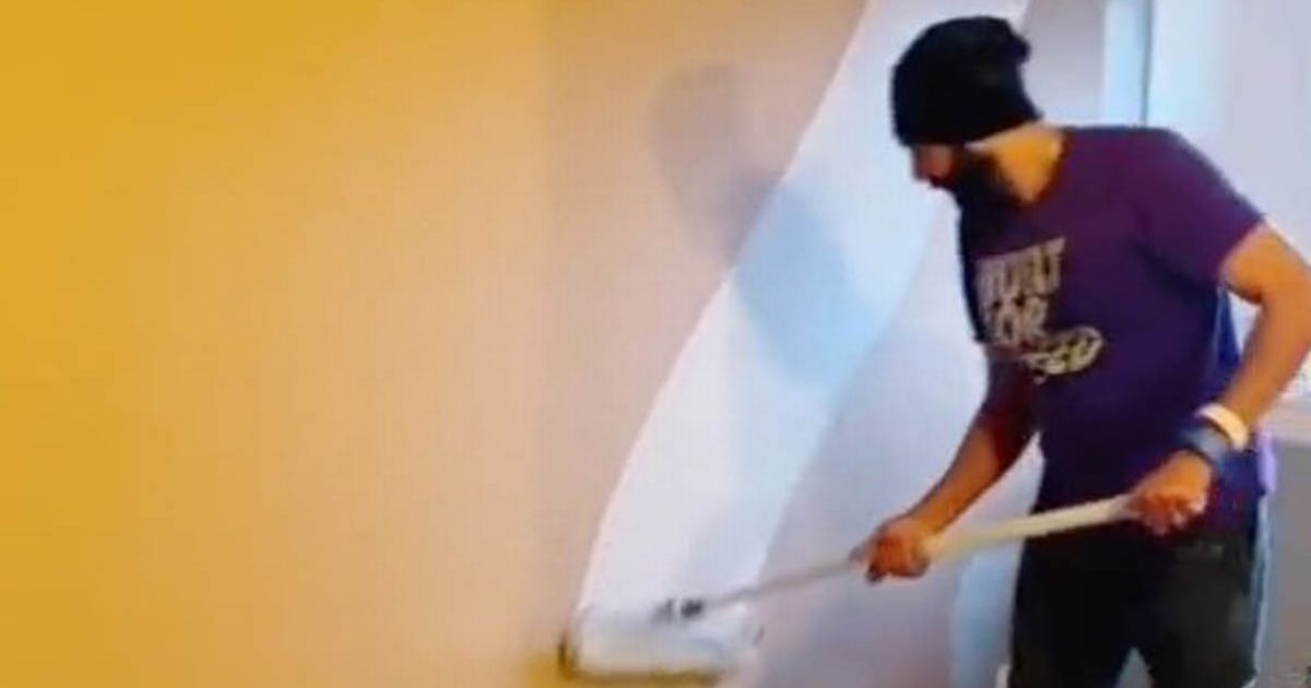 Man crowned DIY king after showing how he paints a whole wall in 30 seconds