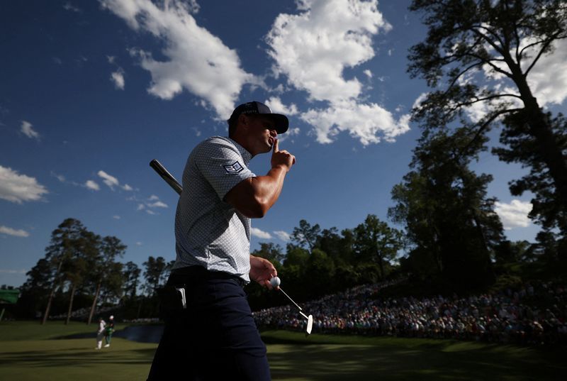 Golf-Masters co-leaders summon patience to battle windy Augusta