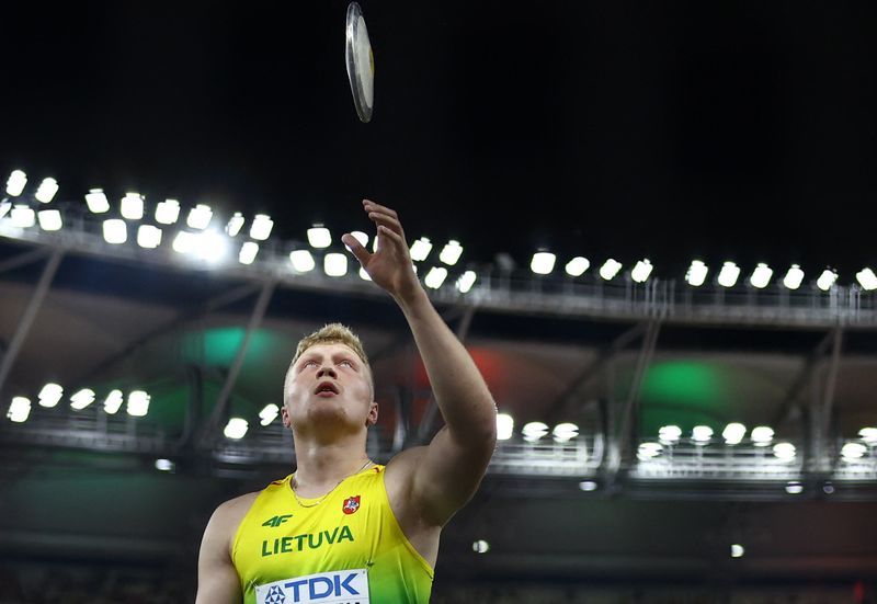 Athletics-Lithuanian Alekna shatters men's discus world record