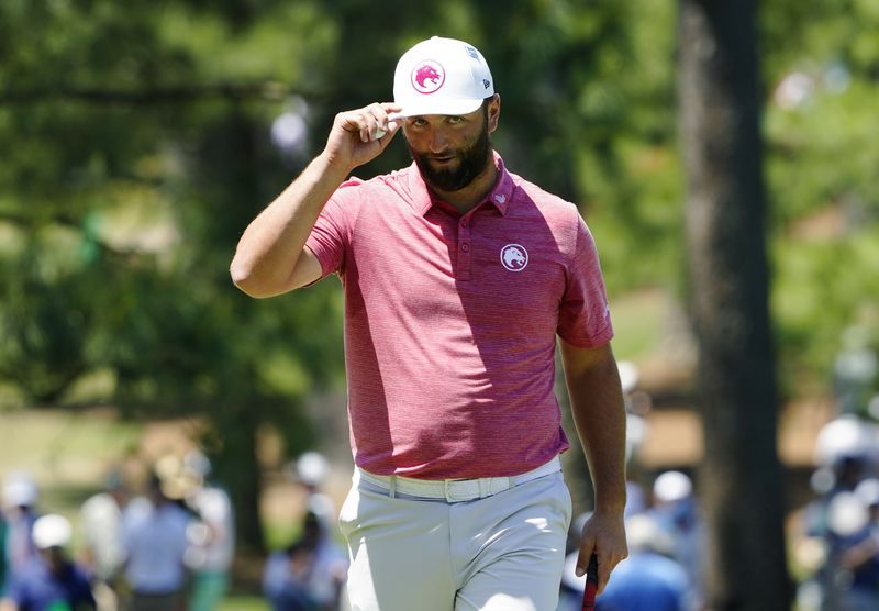 Golf-Rahm and McIlroy left scratching their heads after Masters letdown