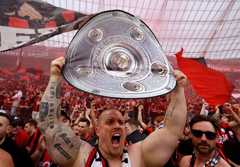 Soccer-Unbeaten Leverkusen execute flawless plan to win maiden Bundesliga title