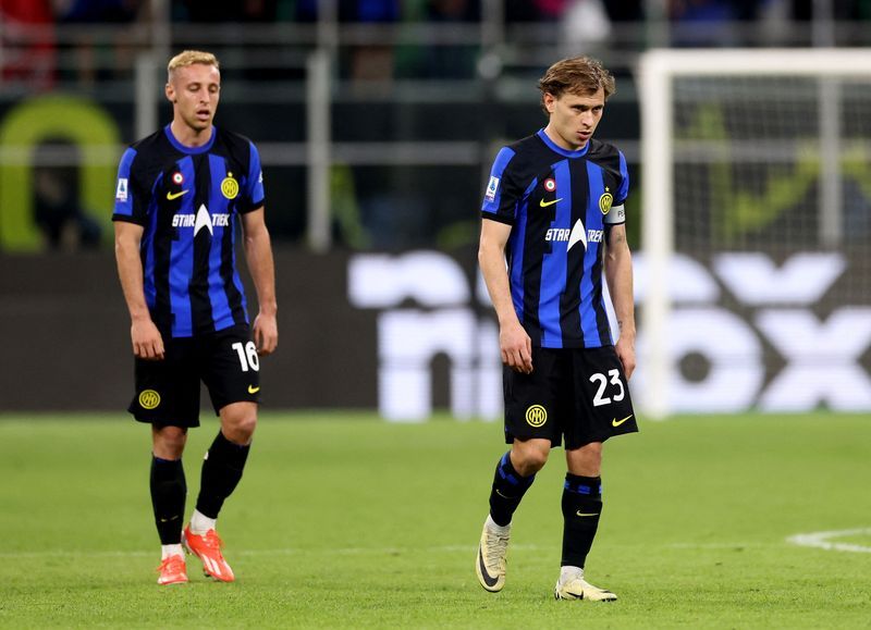 Soccer-Title-chasing Inter held to 2-2 draw by lowly Cagliari