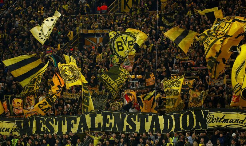 Soccer-Simeone wary of Dortmund's home strength ahead of Champions League return