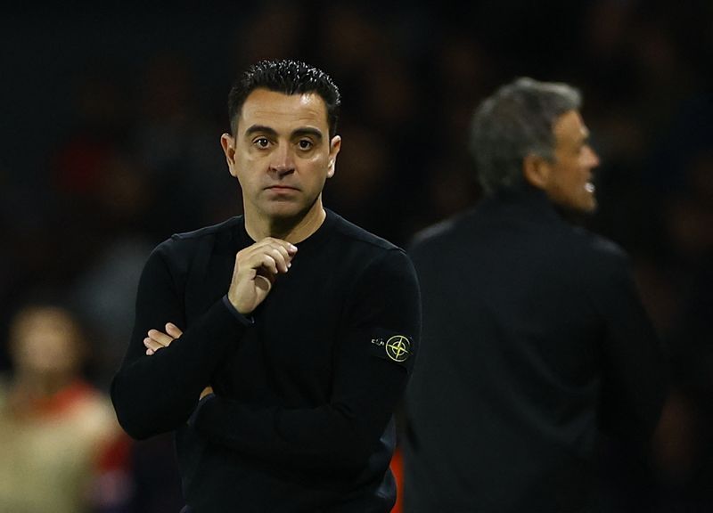 Soccer-Barca ready to suffer in battle against PSG, Xavi says