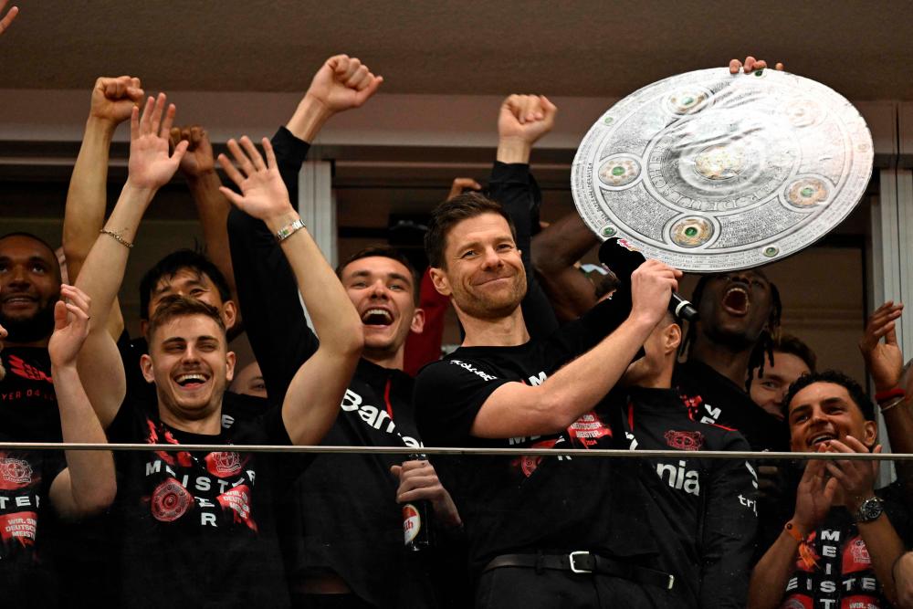 Bayer Leverkusen win men’s German football Bundesliga for first time