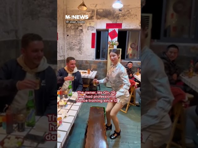 Restaurant owner in China intrigues customers with robotic behavior