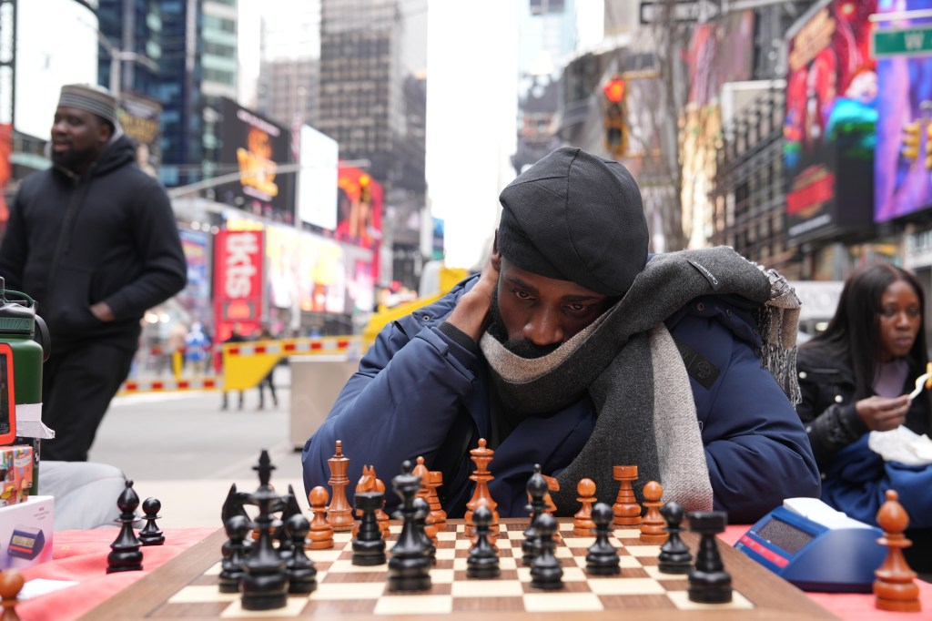 Nigerian chess whiz stays up more than 50 hours playing in Times Square to break world record