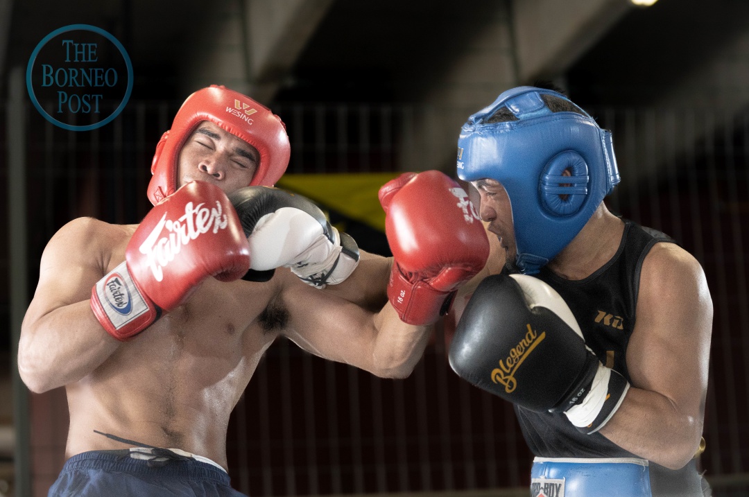 S’wakian ‘Kilat Boy’ spars with Filipino pro boxer Herlan Sixto Gomez to prep for WBC championship (VIDEO)