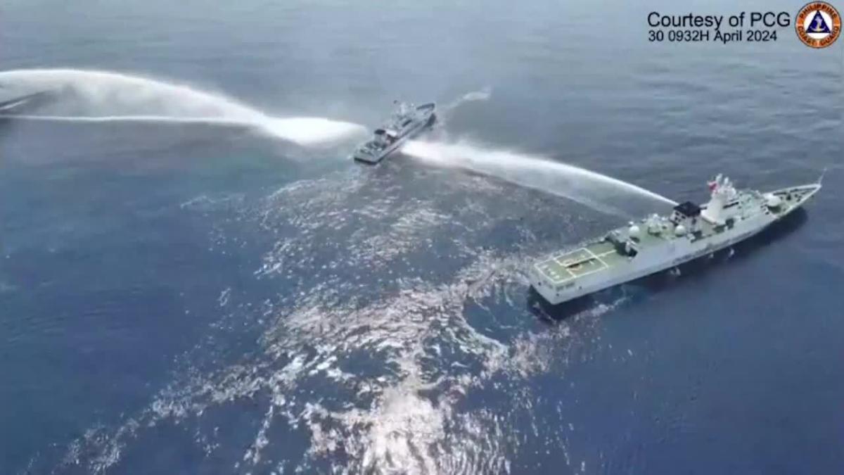 Philippines says China coast guard used water cannon on its vessels