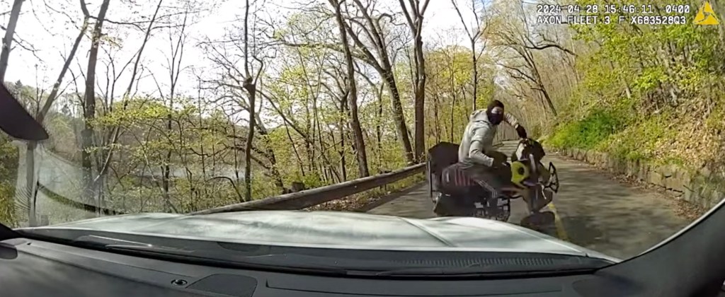 Shocking video shows teen ATV rider smashing into windshield of a cop car that cut him off in Connecticut park