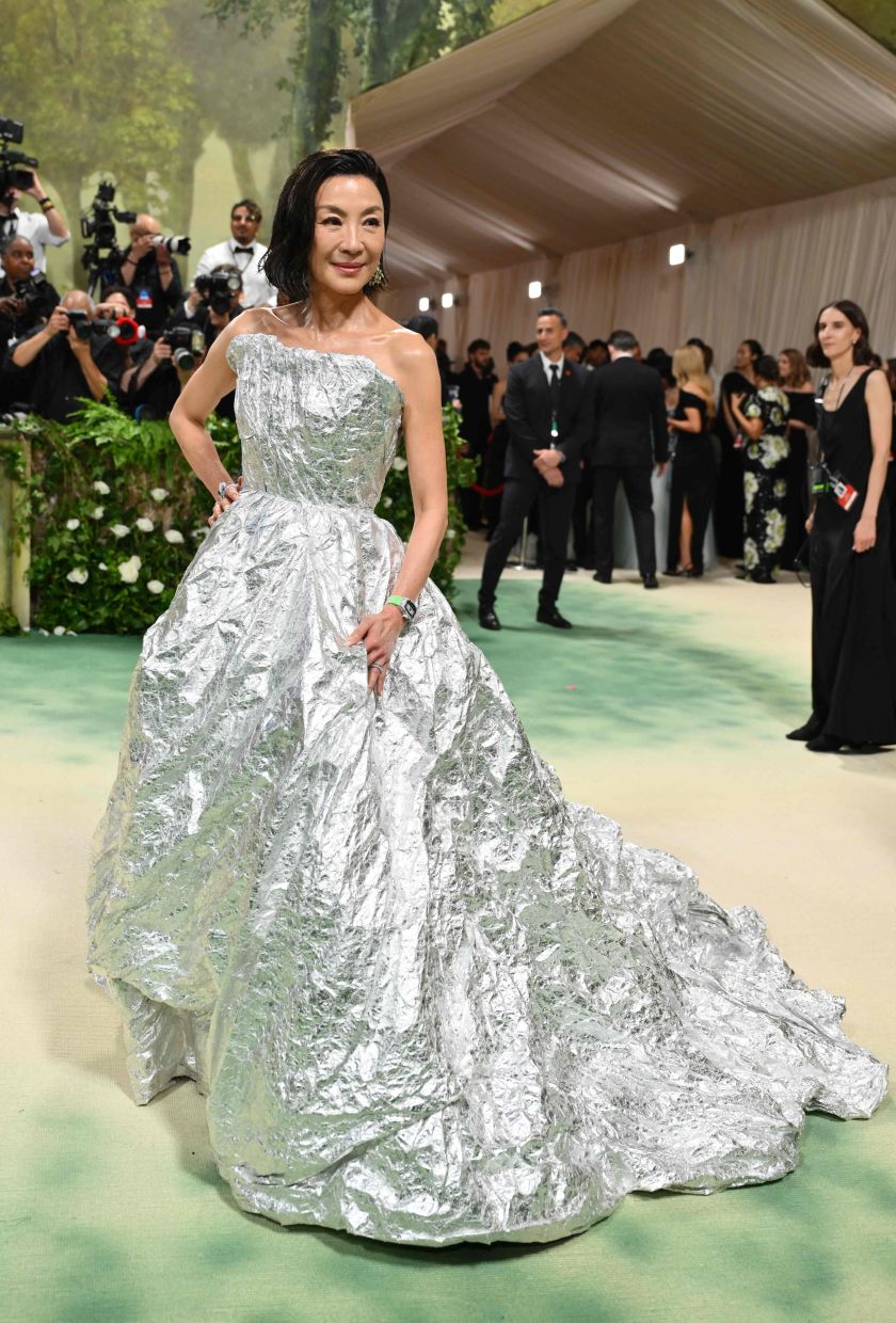 2024 Met Gala: Michelle Yeoh walks red carpet in shiny 'tin foil' dress