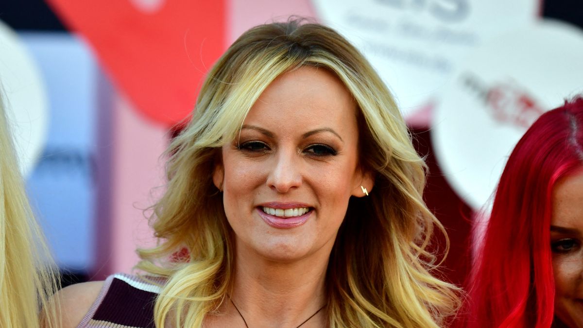 Stormy Daniels 'spanked' PJ-clad Donald Trump with Forbes magazine in secret hotel rendezvous