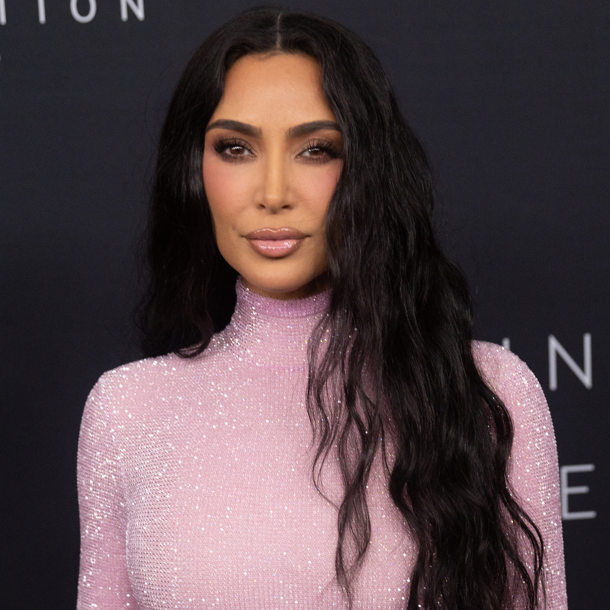 Kim Kardashian Holds Hands With Tesla Robot in New Polarizing Photos