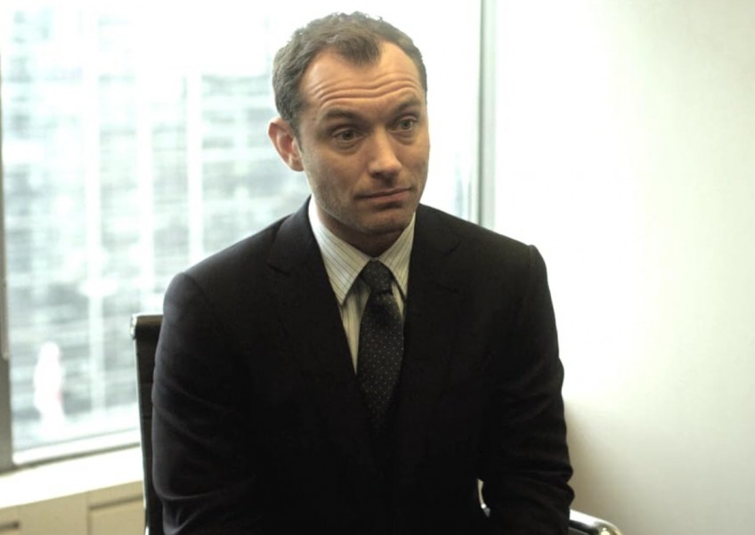 Jude Law wishes he'd embraced good looks before he became 'saggy and balding'