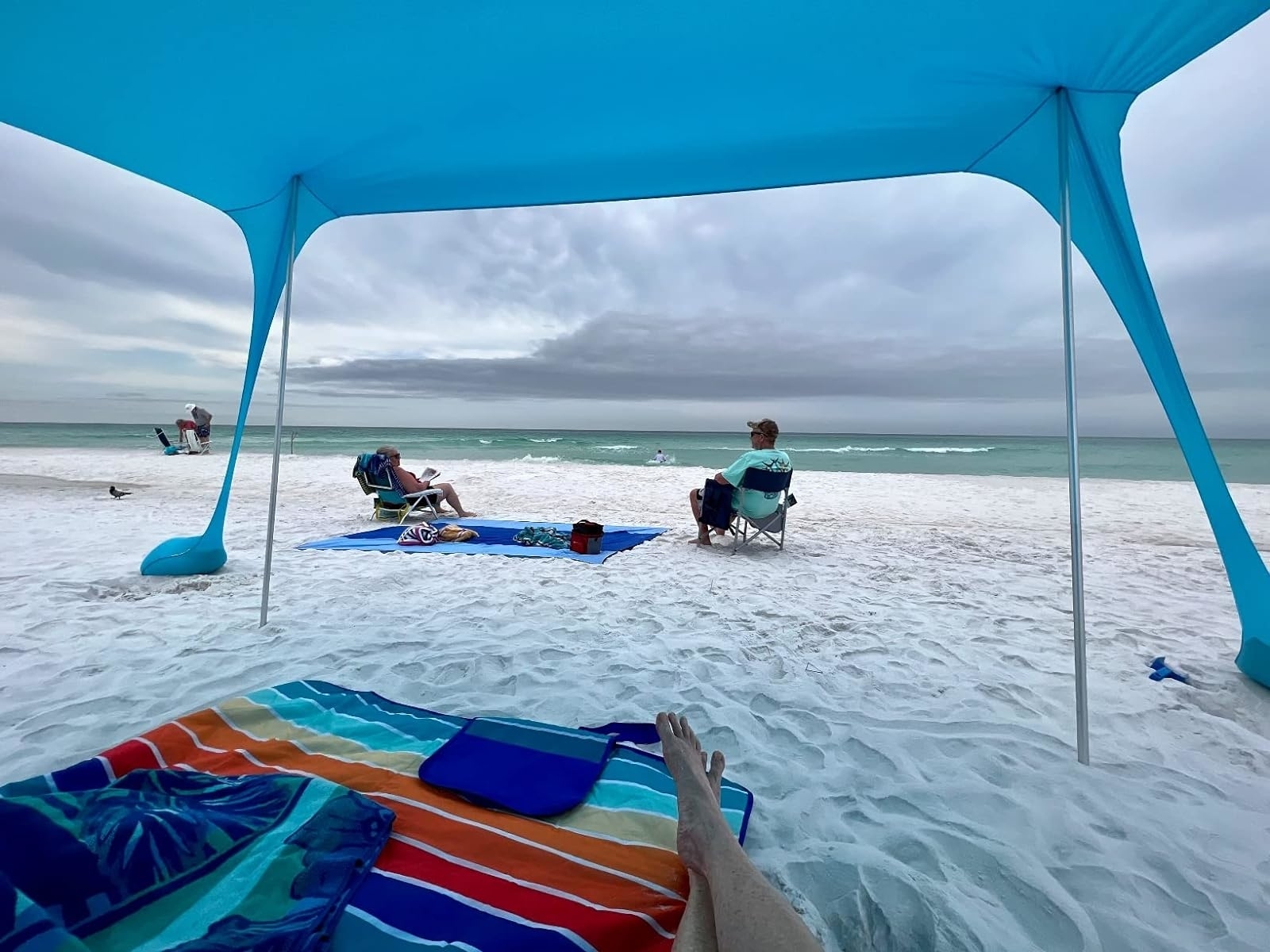 36 Products That’ll Actually Allow You To Enjoy The Beach Without Having To Worry About The Sand, Wind, And More