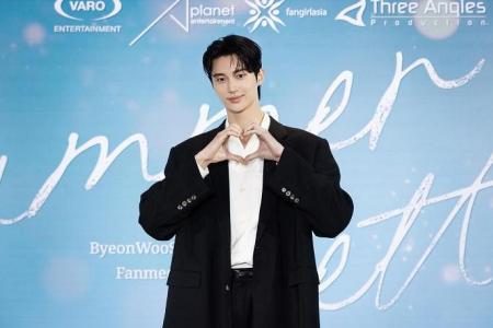 Byeon Woo-seok wins fans with charm and tears at fan meet