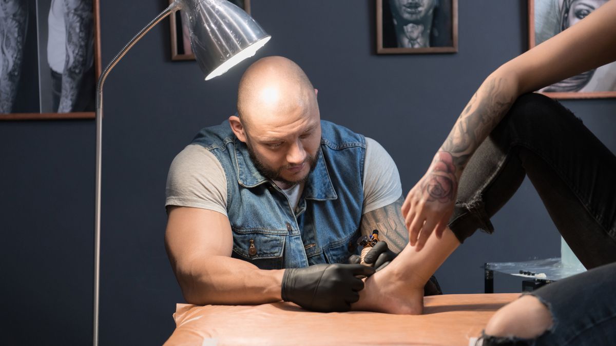 Woman shows off quirky foot tattoo – but everyone's distracted by something else