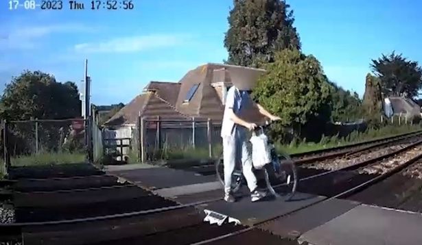 Horror moment kids risk death at level crossings at Surrey’s most dangerous spot