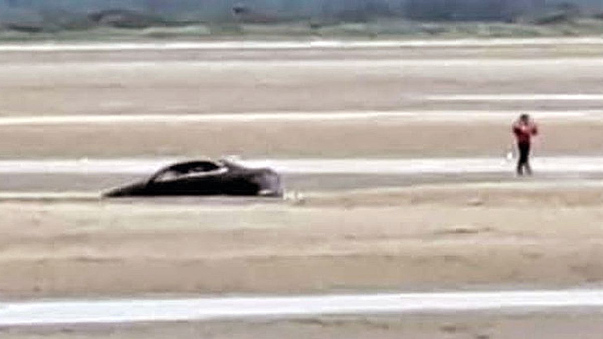 Mercedes driver embarrassed after brand new car sinks into the sand on Wales beach