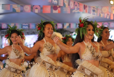 A world away from Paris, drums and dance open Tahiti’s Olympic surfing extravaganza