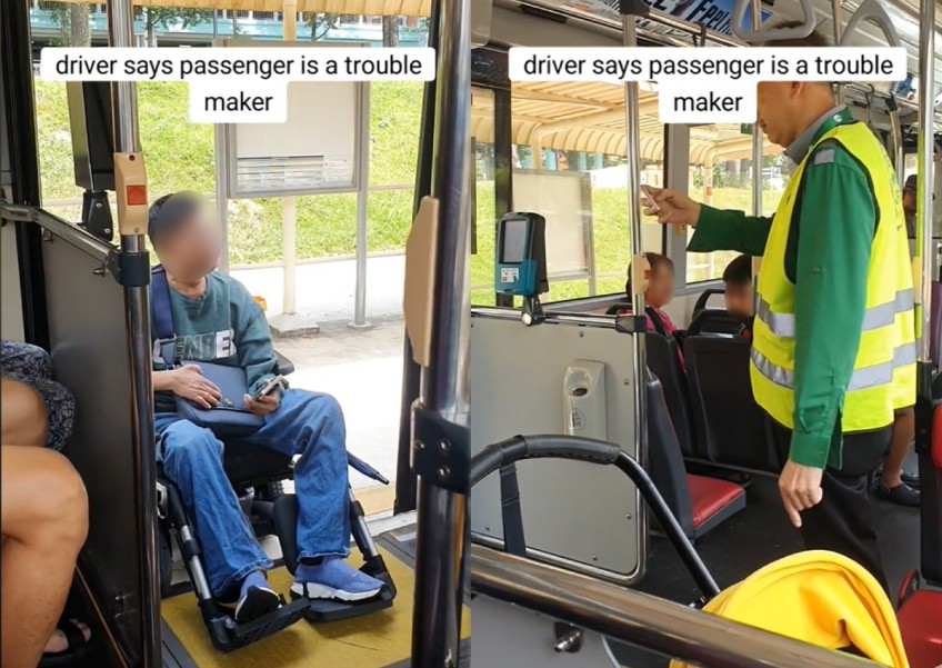 'You're the one wasting time, not me': Wheelchair-bound man argues with bus driver after getting stuck at rear door