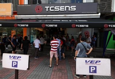 Low-key opening: Malaysia’s Vehicle Entry Permit information counter opens at Singapore’s Woodlands; no public announcements made on location 