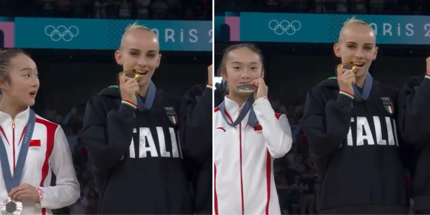 Chinese gymnast learns medal-biting tradition after winning silver, places medal adorably next to mouth