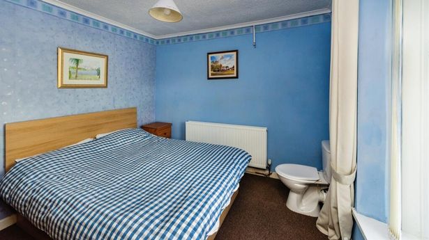 House for sale at £90k with toilet just two feet from end of bed