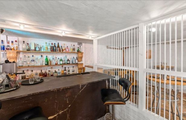 House for sale makes you feel like a prisoner - thanks to uniquely themed bar