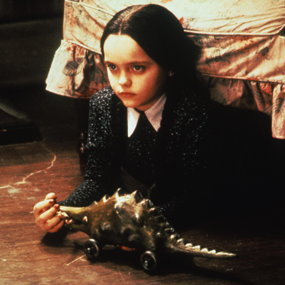 These Spooky Secrets About The Addams Family Movies Are Worth Double Snaps