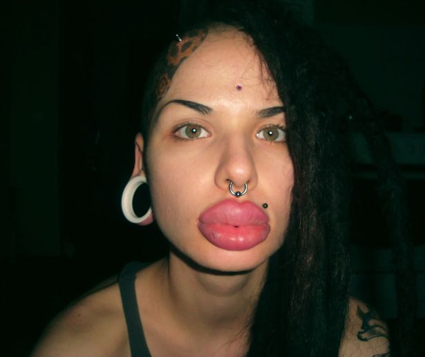 Russian influencer with 'world's biggest lips' found dead in sewer weeks after vanishing