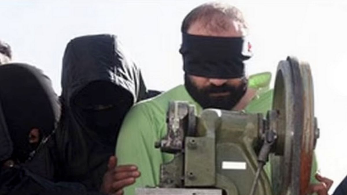 Iran amputates four fingers of two thieves with guillotine machine in rare Sharia law punishment