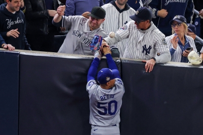 Yankee fans who interfered with Dodgers’ Betts grab barred from fifth game of the World Series